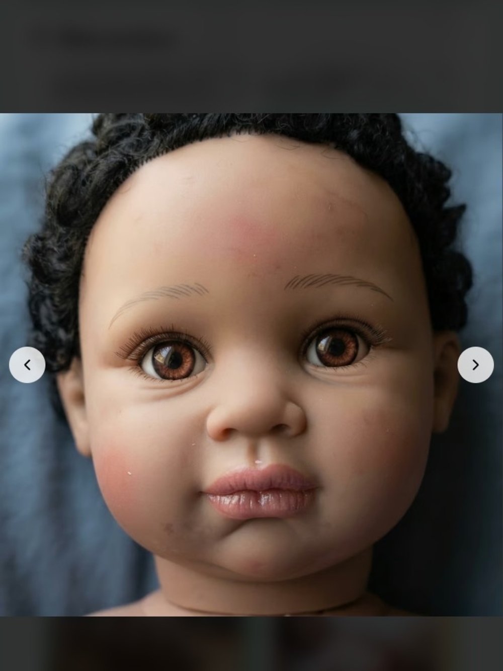 Reborn Brown-Eyed Doll with Brown Hair and Realistic Skin Tones
